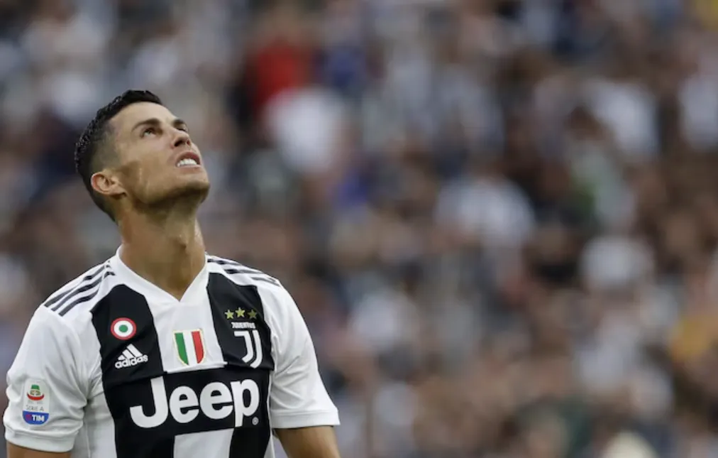 The Setting: A Press Conference in Turin
